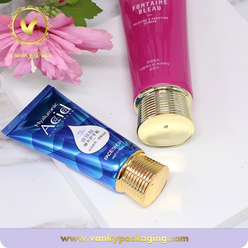 High quality empty plastic cosmetic tube for face cream  with gold cap