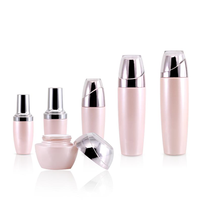 High end pink color customized glass bottle and jar packaging set with silver head